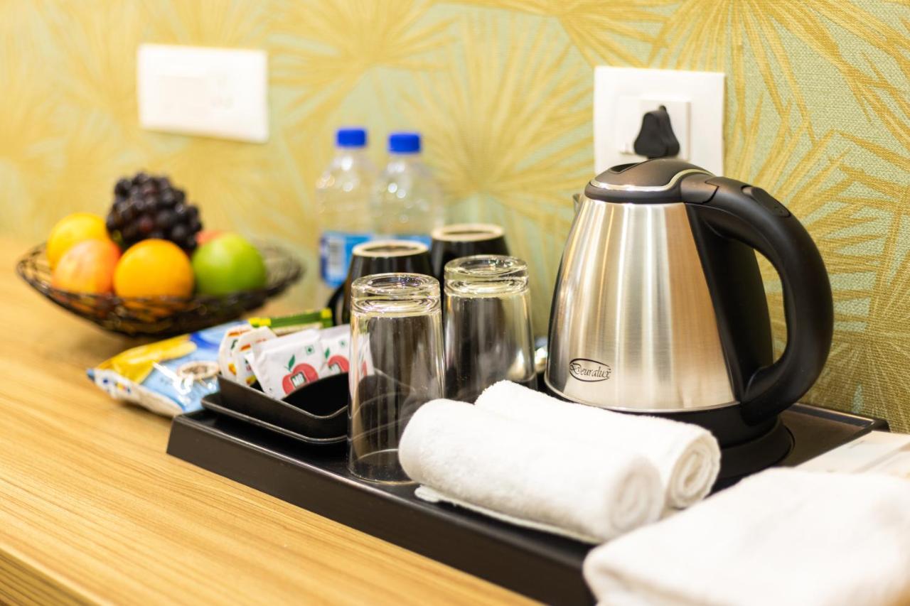 Esaa Airport Hotel Kochi Buitenkant foto