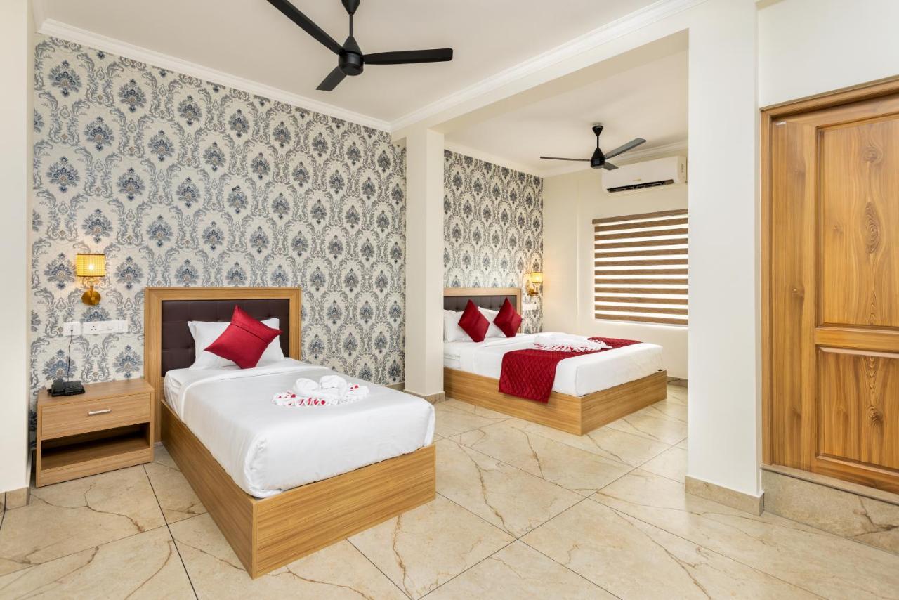 Esaa Airport Hotel Kochi Buitenkant foto