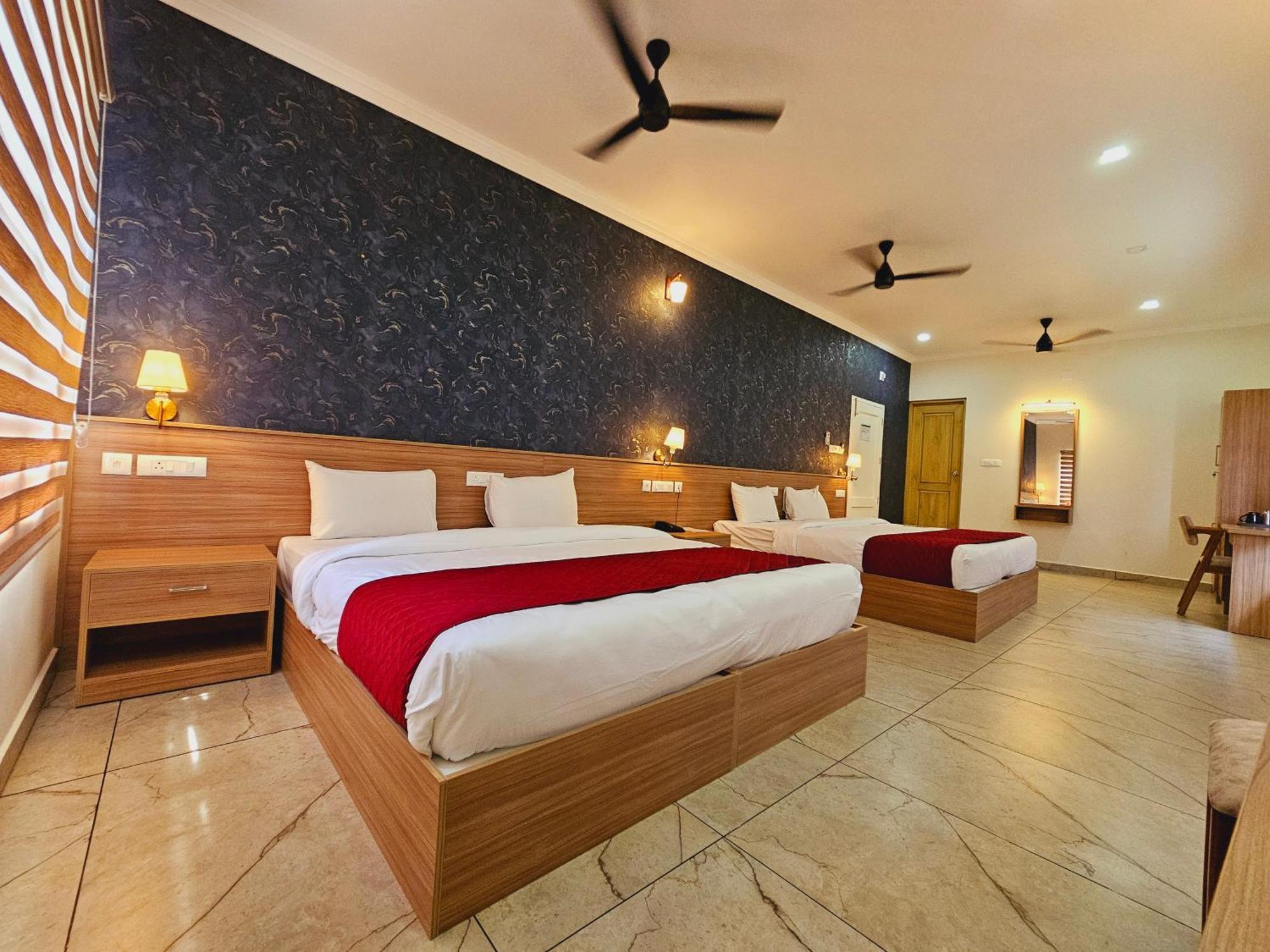 Esaa Airport Hotel Kochi Buitenkant foto