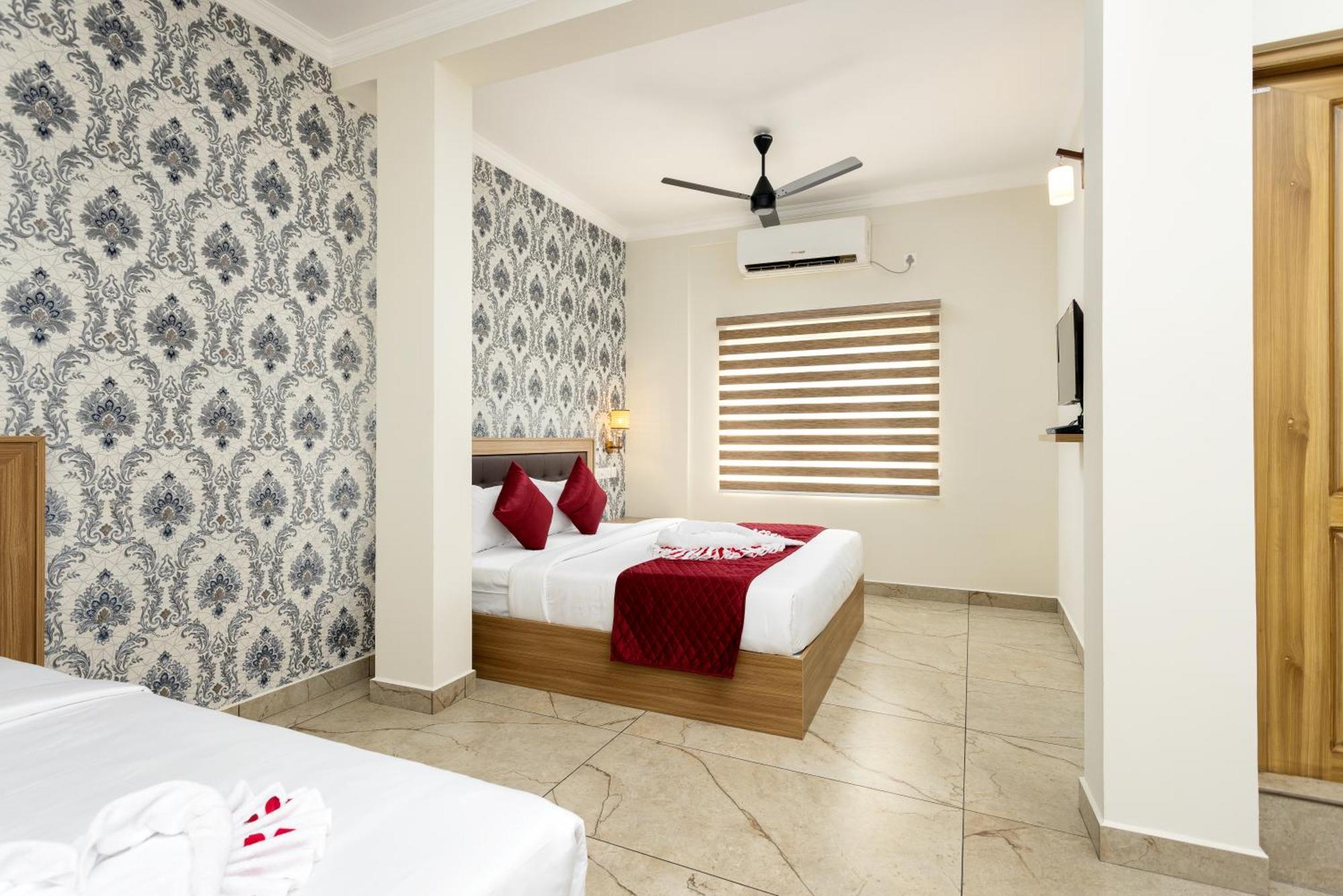 Esaa Airport Hotel Kochi Buitenkant foto