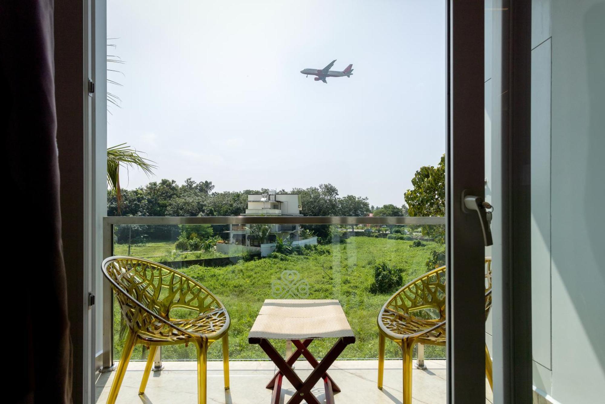 Esaa Airport Hotel Kochi Buitenkant foto